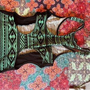 Never worn, Nollie tank with side cut outs